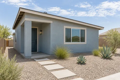 Illustrative Arizona b4 courtyard free blue gray bungalow; not a specific community or available property. Not a depiction of La Privada or an available home.