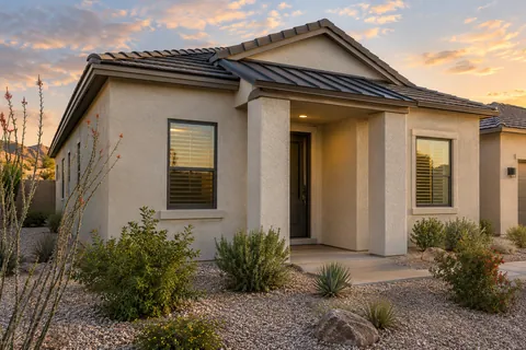 Illustrative Arizona b4 single level bungalow dusk; not a specific community or available property. Not a depiction of The Vineyard or an available home.