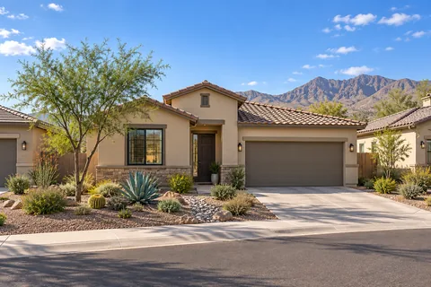 Illustrative single-story Arizona home with desert-adapted landscaping; not a specific community or available listing. Illustrative concept only; not a photograph or exact depiction of this home.