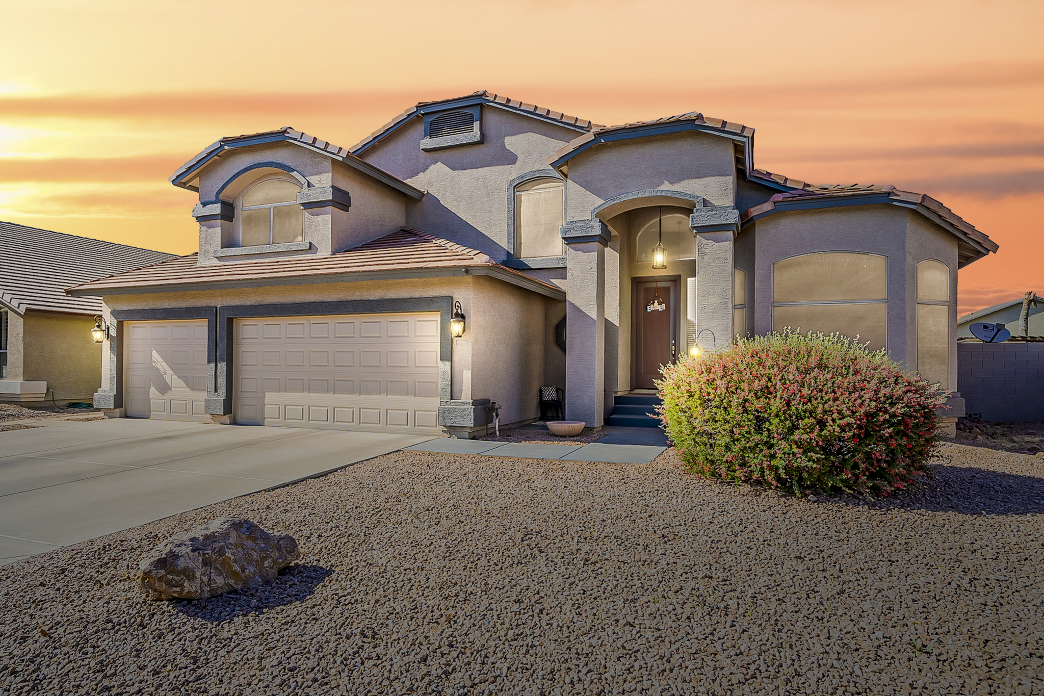 Andrew Piane Gilbert, AZ Listing Photo showing a twilight image of the front of the home