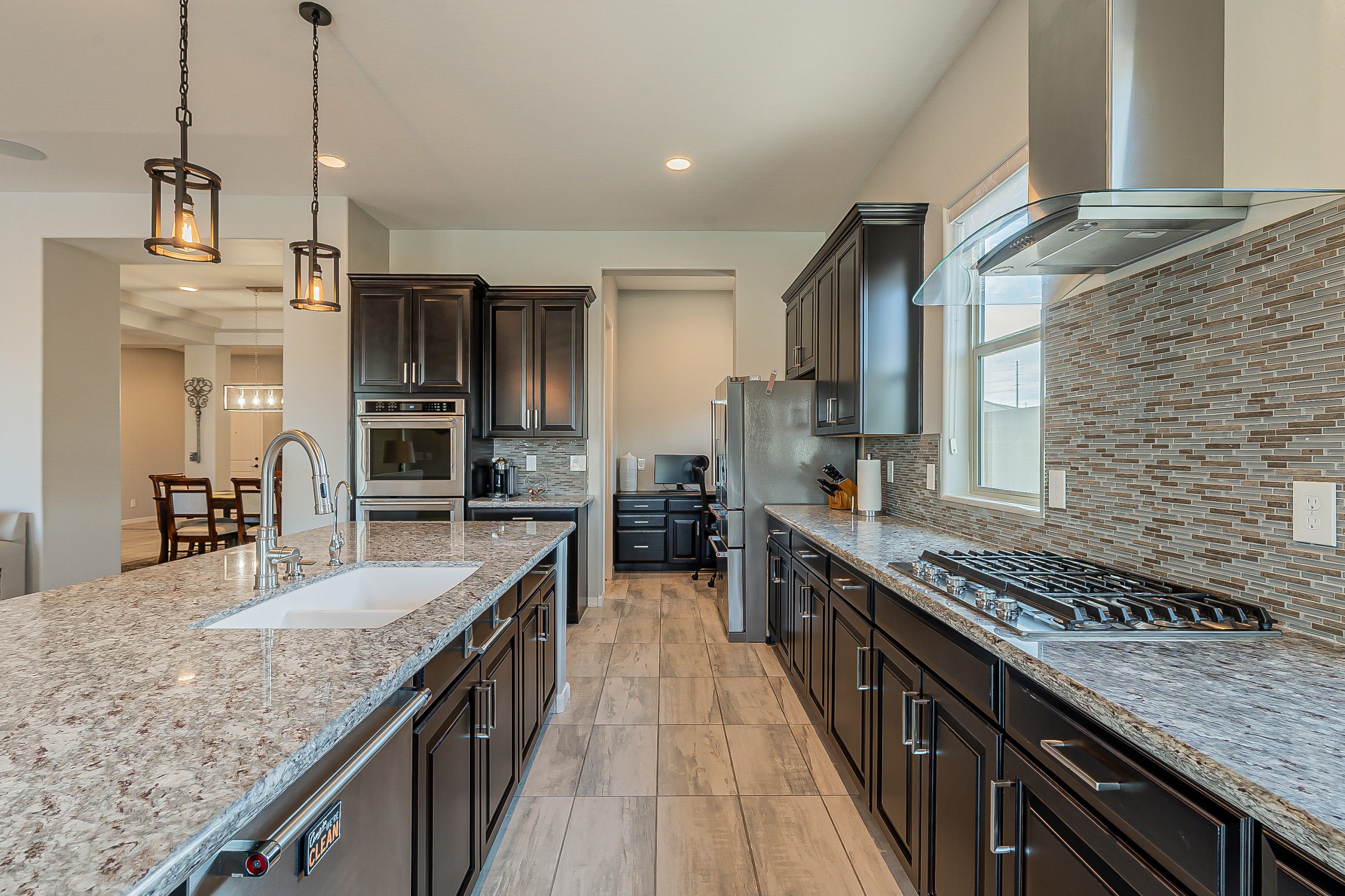 photo of a luxury chefs kitchen inside of a sold home in goodyear, az