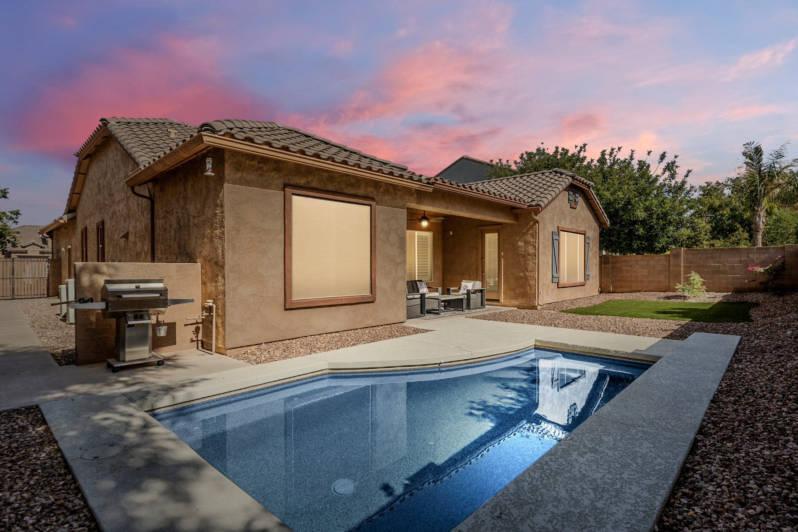 Andrew Piane Chandler, AZ Listing Photo showing a blue pool and desert backyard