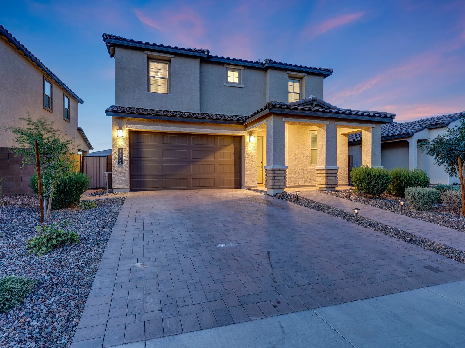 Avondale Two-Story Home at Twilight Two-story Avondale Arizona home with a covered front porch at twilight