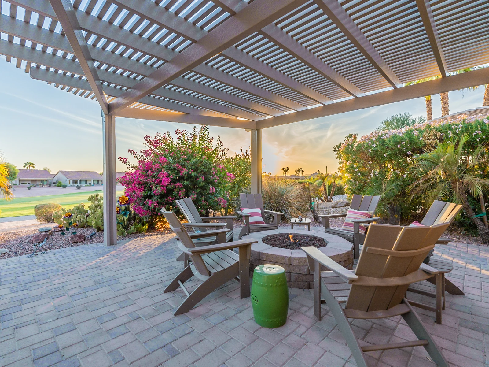 Goodyear Covered Patio at Sunset Covered patio with seating and a fire pit at a Goodyear Arizona home