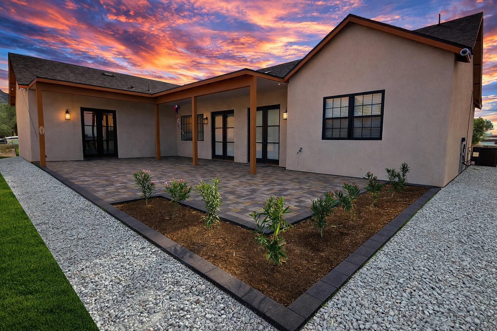 Back patio and residence at 9845 S 31st Avenue in Laveen at dusk