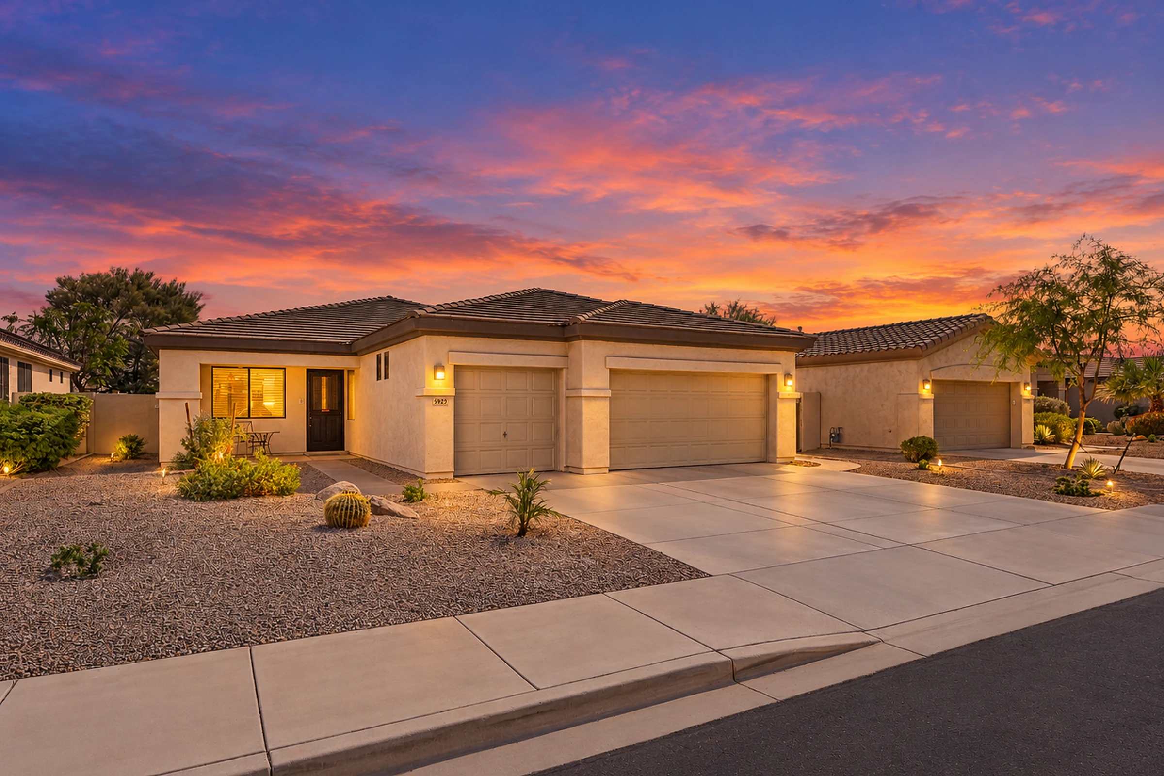 Twilight front exterior of 3993 N 146th Lane in Goodyear